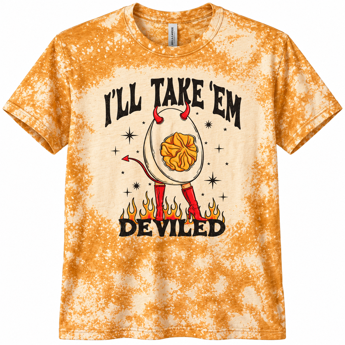 A short-sleeve crewneck t-shirt featuring a golden-yellow acid wash tie-dye pattern. The front has a graphic of a toilet paper egg with devil horns and legs, standing on flames, with the text 'I'LL TAKE 'EM DEVILED' in black.